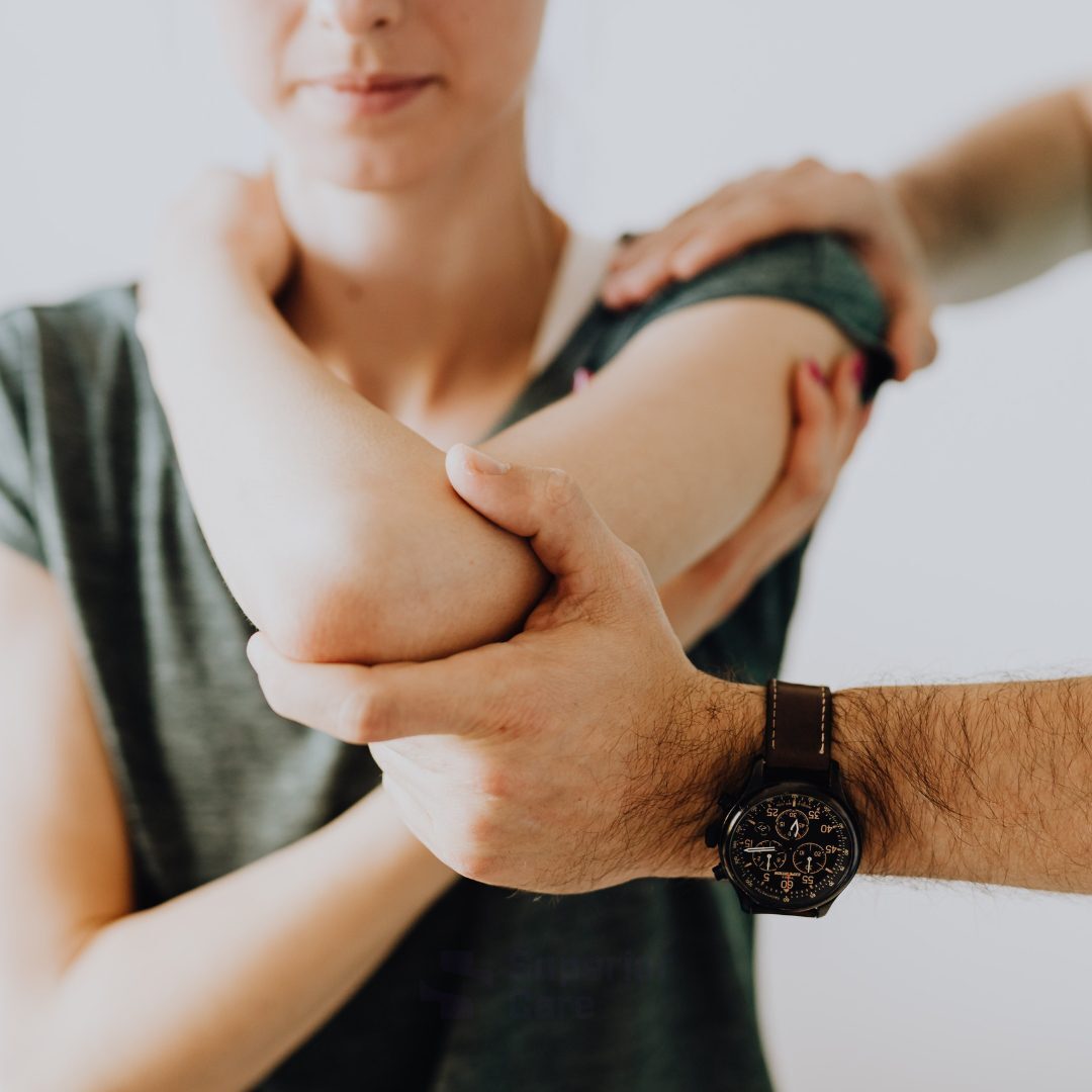 Physical therapy session for elbow treatment.